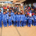 The whole school lined up in blue