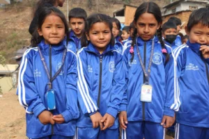 Students in their new blue tracksuits