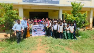 Group photo with the program banner